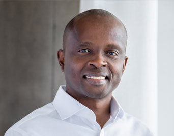 Headshot of Peter Muriungi, CEO of Chase Auto