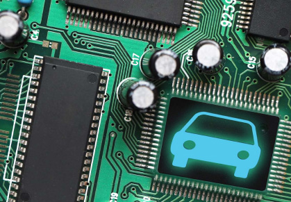 Close up of a microchip with a car icon on it