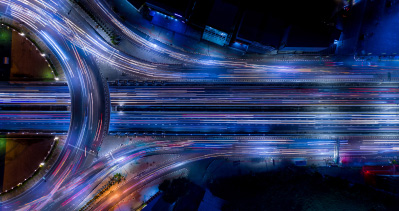 A long exposure photograph of traffic on a busy highway